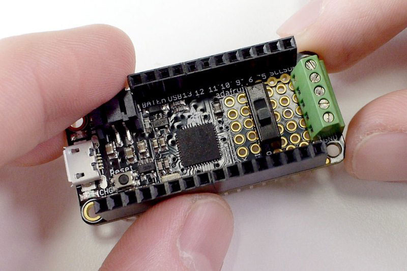 Position the terminal block and slide switch