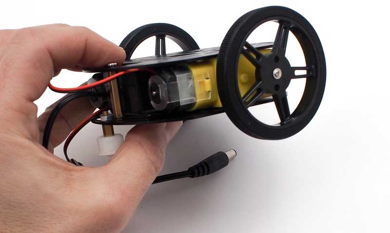 Place the middle chassis layer onto robot