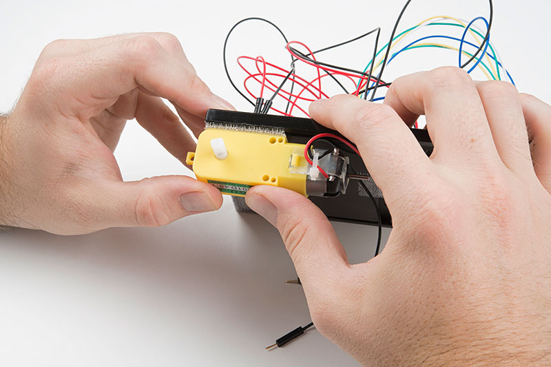Press the motors to the baseplate